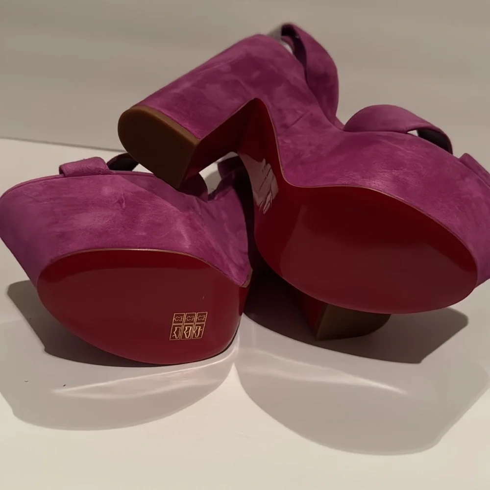 Brand New. Never worn. Christian Louboutin Purple Platform Sandals